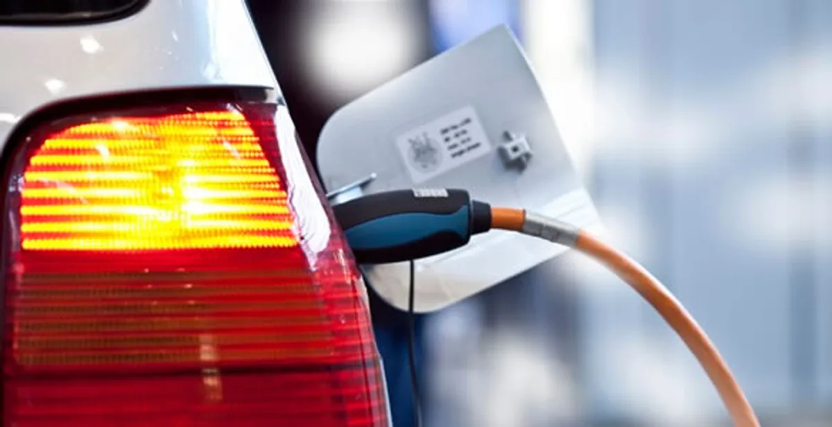 Electric car plugged into EV charger after professional installation in Boca Raton, FL