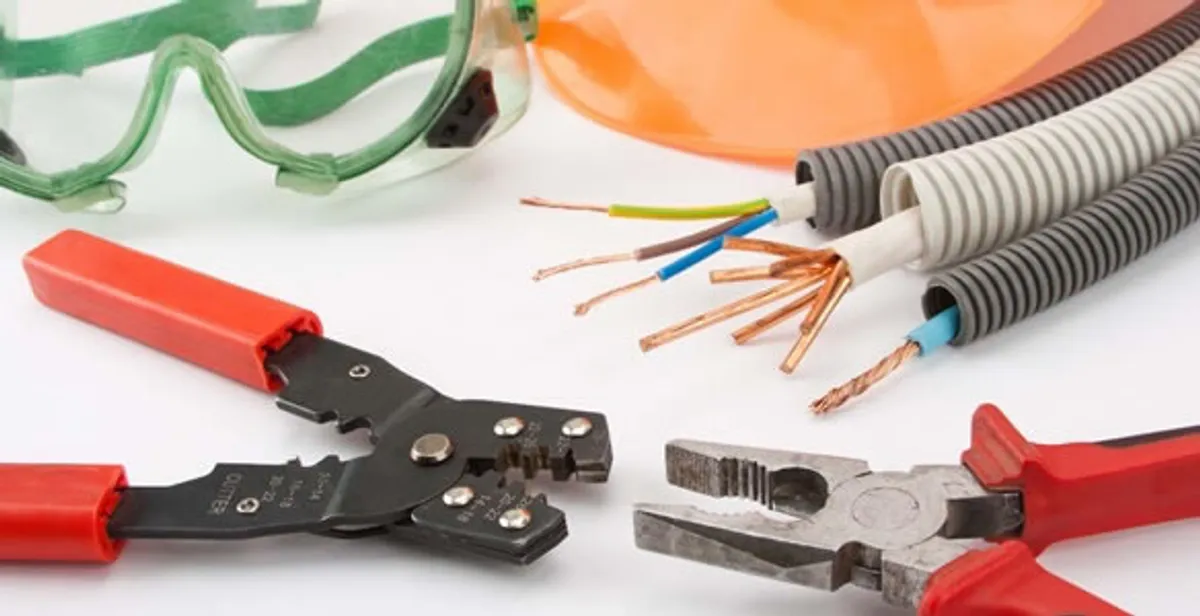 Electrical wiring repair with professional tools and safety equipment in Boynton Beach, FL