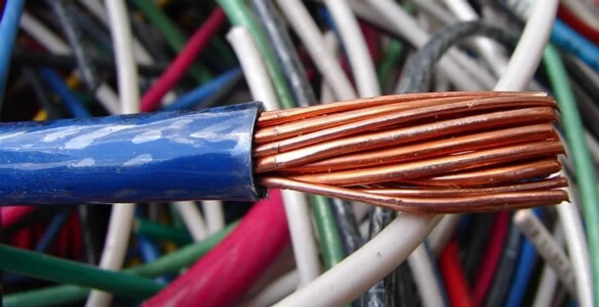 electrical wiring services showing exposed copper conductors and cable preparation in Boca Raton, FL