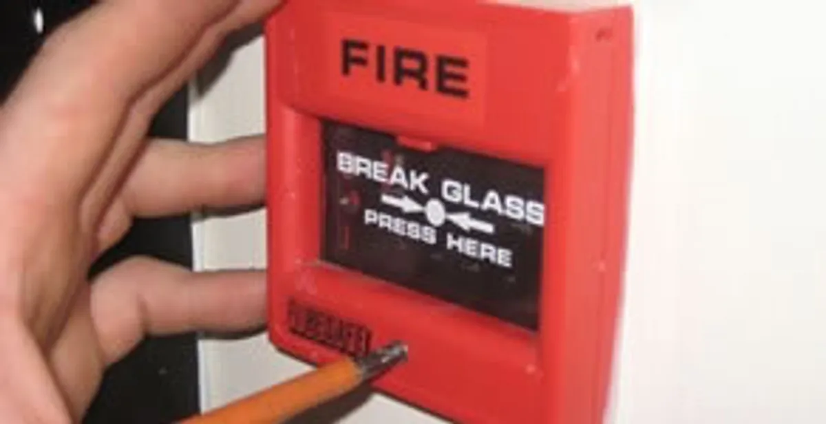 fire alarm installation service showing manual fire alarm pull station installed by licensed electricians in Boca Raton, FL