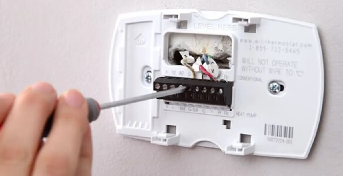 Thermostat installation service with proper wiring and secure wall mounting in Boca Raton, FL