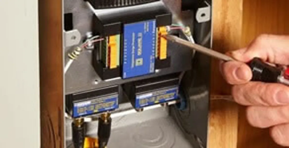 Whole home surge protection device being installed by a licensed electrician to protect electrical systems in Boca Raton, FL